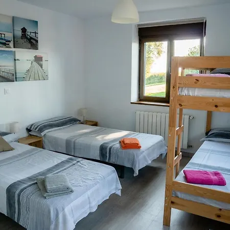 Oyambre Surf House Гостевой дом *